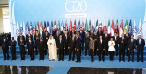 epa05026570 Leaders pose for the family photo at G20 summit in Antalya, Turkey, 15 November 2015. In additional to discussions on the global economy, the G20 grouping of leading nations is set to focus on Syria during its summit this weekend, including the refugee crisis and the threat of terrorism.  EPA/TOLGA BOZOGLU