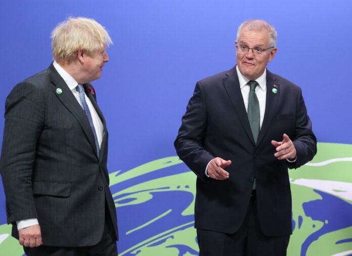 На снимката: британският премиер Борис Джонсън и австралийският премиер Скот Морисън