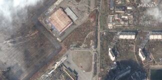 Сателитно изображение, предоставено от Maxar Technologies, показва разрушения търговски център Portcity в Мариупол. Забелязват се значителни щети на цивилната инфраструктура.