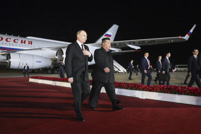 СподелиПрезидентът на Русия Владимир Путин и лидерът на Северна Корея