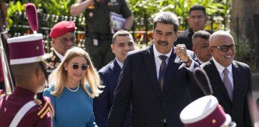 Президентът на Венецуела Николас Мадуро и съпругата му Чилиа Флорес