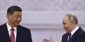 Руският президент Владимир Путин и китайският му колега Си Цзинпин на днешната им среща в Москва.