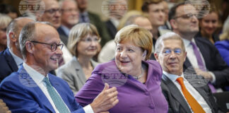 Бившият германски канцлер Ангела Меркел и федералният председател на ХДС и лидер на парламентарната група на ХДС Фридрих Мерц,