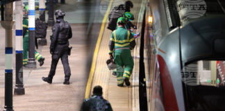 Служители на службите за извънредни ситуации при влака, в който е станало кръвопролитието вчера, на жп гарата в Хънтингдън