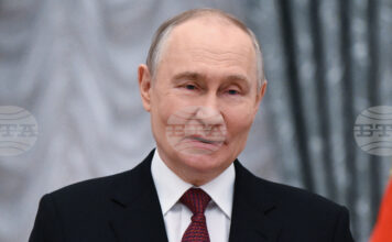 Путин