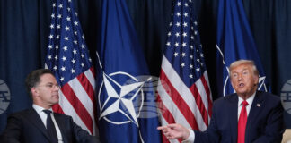 Американският президент Доналд Тръмп и генералният секретар на НАТО Марк Рюте по време на среща в кулоарите на Световния икономически форум в Давос, 21 януари 2026 г