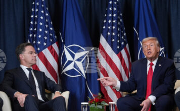 Американският президент Доналд Тръмп и генералният секретар на НАТО Марк Рюте по време на среща в кулоарите на Световния икономически форум в Давос, 21 януари 2026 г