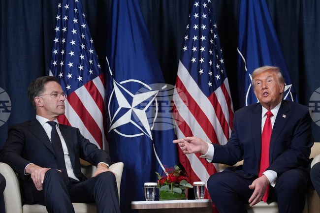 Американският президент Доналд Тръмп и генералният секретар на НАТО Марк Рюте по време на среща в кулоарите на Световния икономически форум в Давос, 21 януари 2026 г