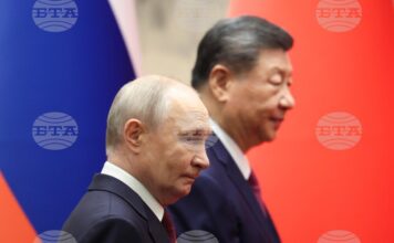 Руският президент Владимир Путин и Китайският му колега в Голямата зала на народа в Пекин, 20 май 2026 г.
