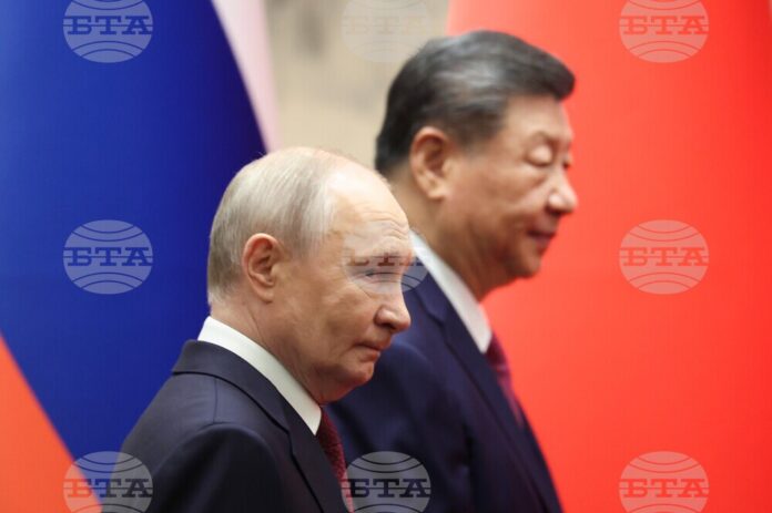 Руският президент Владимир Путин и Китайският му колега в Голямата зала на народа в Пекин, 20 май 2026 г.