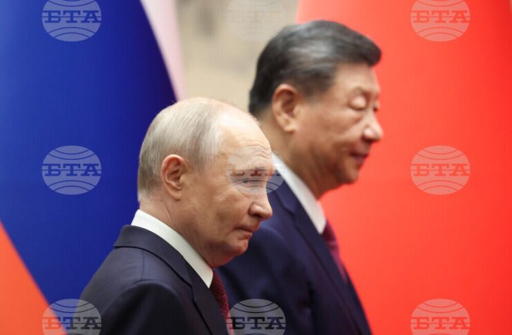 Руският президент Владимир Путин и Китайският му колега в Голямата зала на народа в Пекин, 20 май 2026 г.