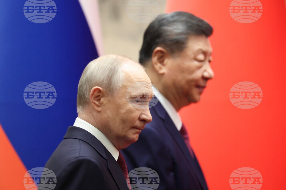 Руският президент Владимир Путин и Китайският му колега в Голямата зала на народа в Пекин, 20 май 2026 г.